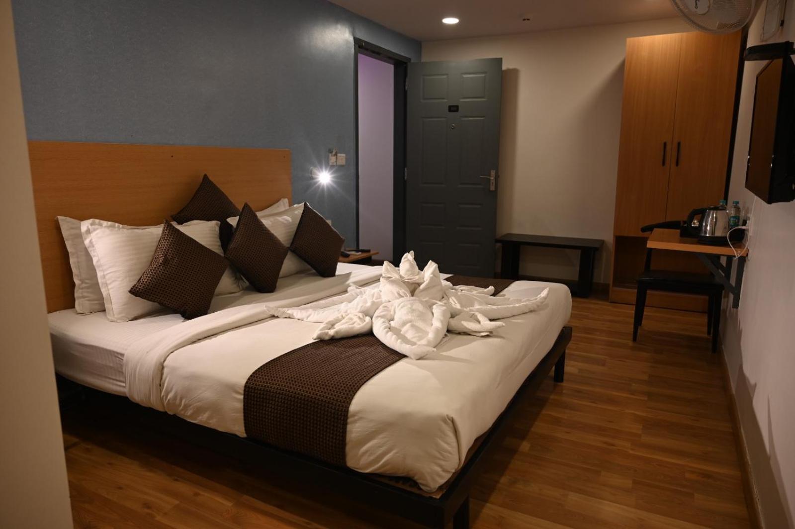 Alchemy Suites Бенґалуру Номер фото